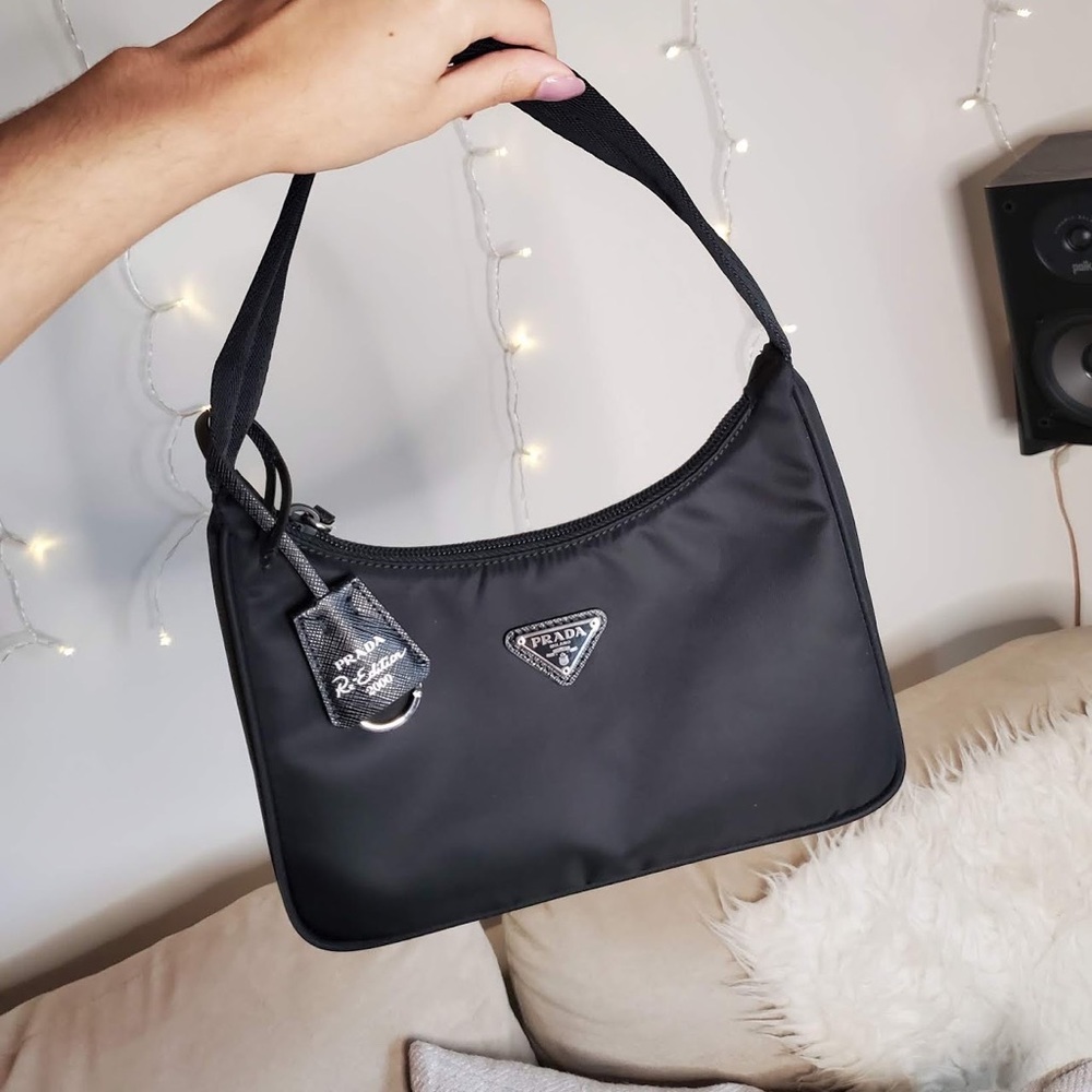 Prada re-edition hand bag. New with tags still attached.